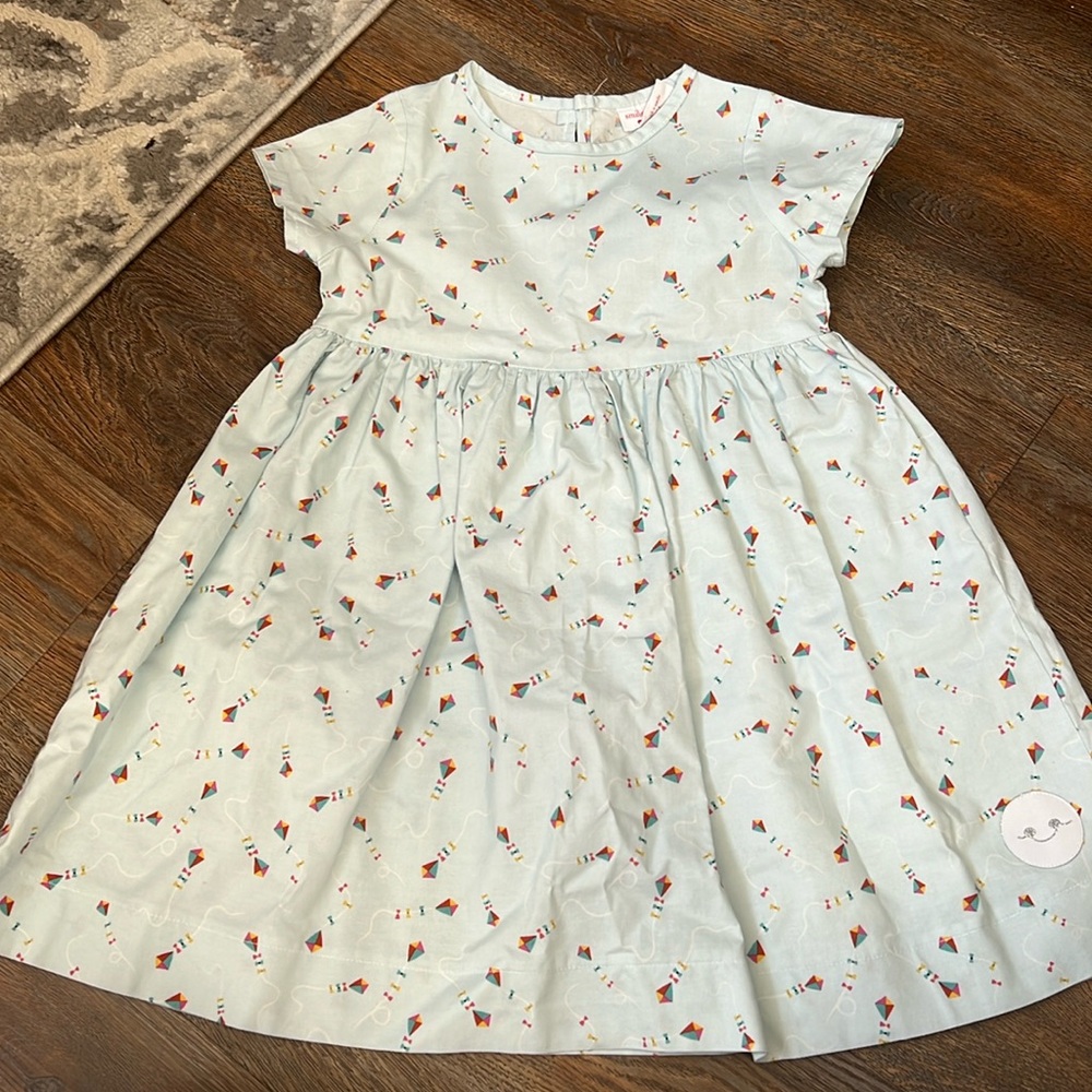 Smiling button dress